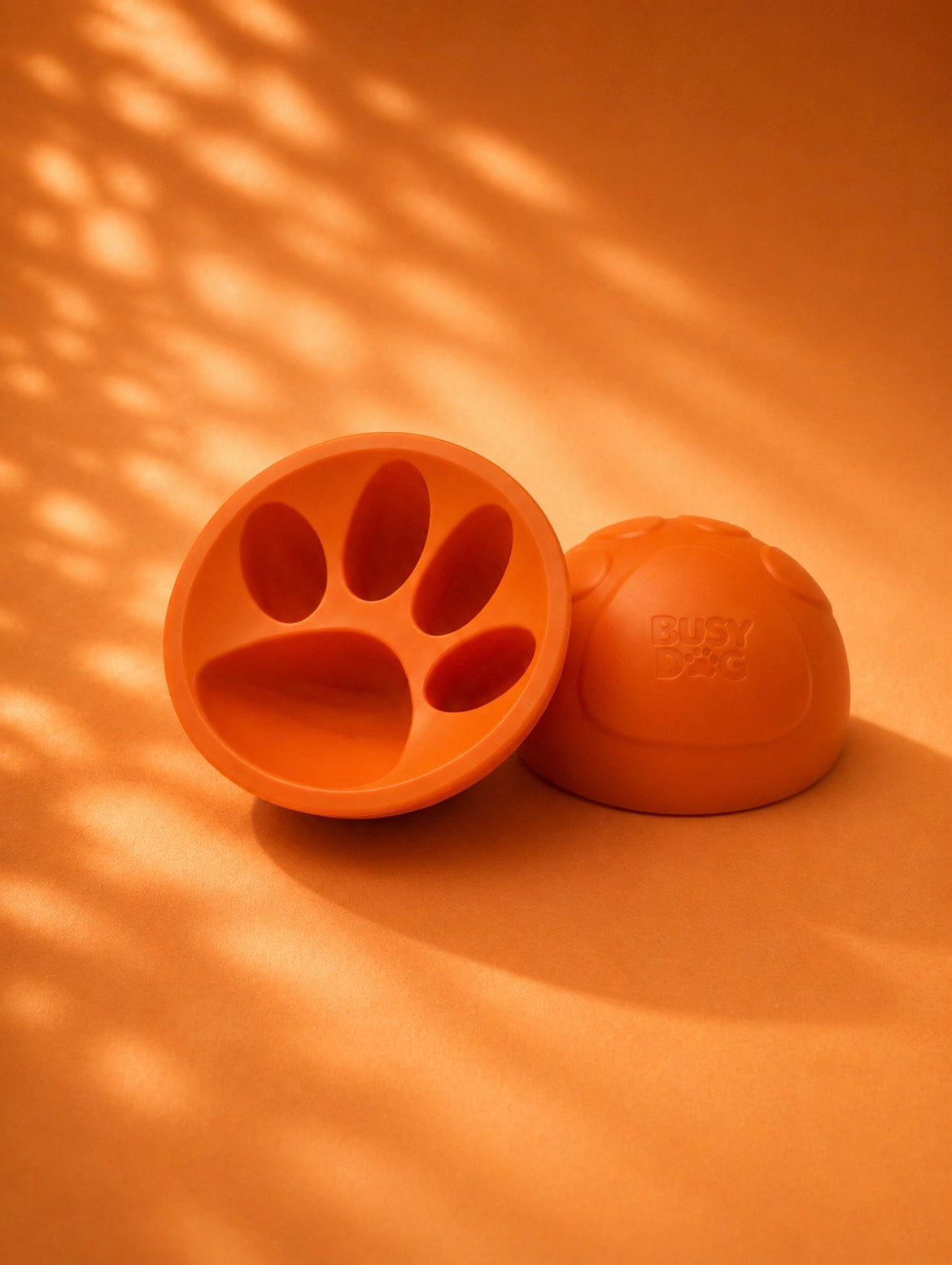 Silicone paw-shaped dog enrichment toy for frozen treats, mental stimulation and calming enrichment.