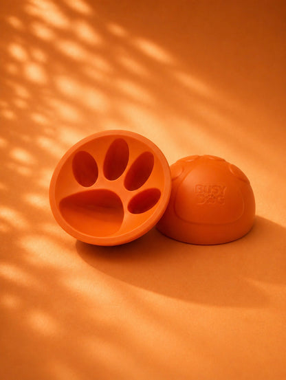 Silicone paw-shaped dog enrichment toy for frozen treats, mental stimulation and calming enrichment.